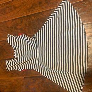 White and black dress with red bow on the back